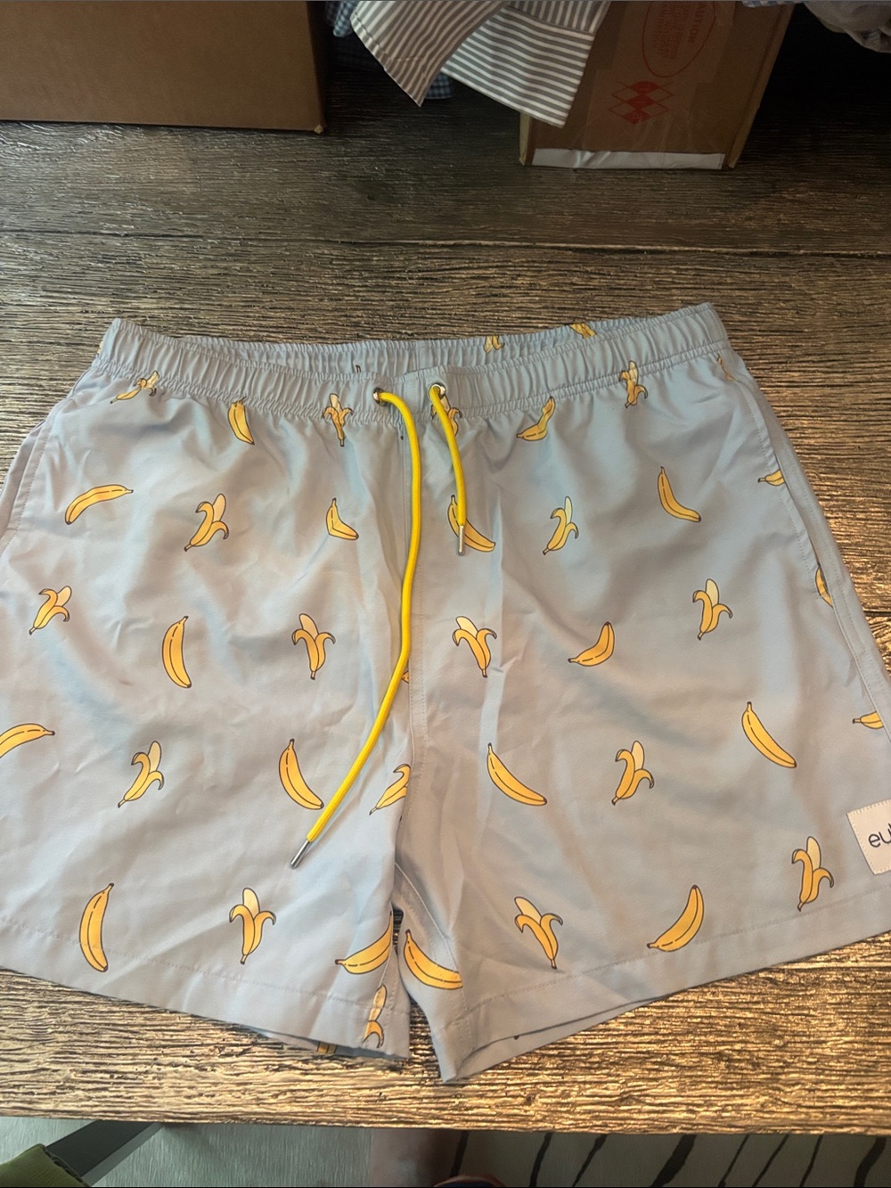 Light Blue Banana-Print Swim Trunks with Yellow Drawstring